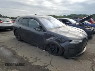 ✅ 2024 BMW iX xDrive50 • VIN: WB523CF01RCN99037 • Лот: 64291224. Опубликован ранее на Copart с пробегом 26 259 миль. Бесплатный доступ к архиву аукционных продаж из США и подробный отчёт об истории автомобиля на DreamBid. Изображение 4.