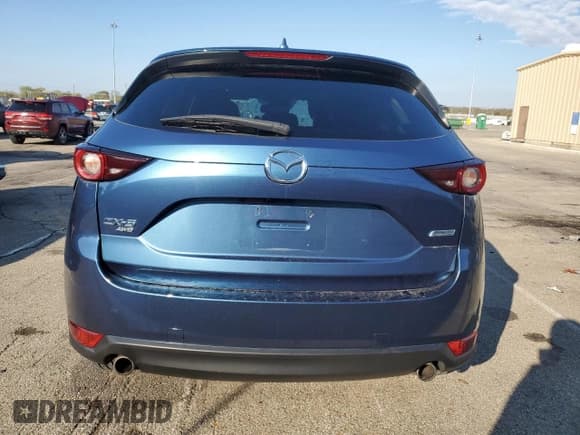 ✅ 2018 Mazda CX-5 Touring • VIN: JM3KFBCM2J0346402 • Lot: 90714345. Wystawiony na Copart z przebiegiem 56 245 mil. Bezpłatny archiwum sprzedaży aukcyjnych z USA i szczegółowy raport historii pojazdu na DreamBid. Zdjęcie 6.