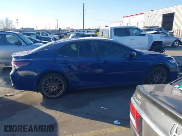 2023 Toyota Camry SE with VIN 4T1G11BK5PU105423, listed as a IAAI auction lot 41414587 with 38,527 mi miles and . Bid and sale history available at DreamBid. Image 13.