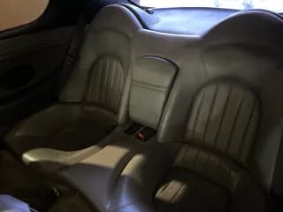 ✅ 2004 Maserati Coupe • VIN: ZAMBC38A240012148 • Lot: 66689845. Wystawiony na Copart z przebiegiem 87 977 mil. Bezpłatny archiwum sprzedaży aukcyjnych z USA i szczegółowy raport historii pojazdu na DreamBid. Zdjęcie 6.