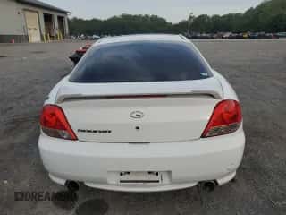 ✅ 2005 Hyundai Tiburon GS • VIN: KMHHM65D35U184724 • Лот: 84444495. Опубликован ранее на Copart с пробегом 203 238 миль. Бесплатный доступ к архиву аукционных продаж из США и подробный отчёт об истории автомобиля на DreamBid. Изображение 6.