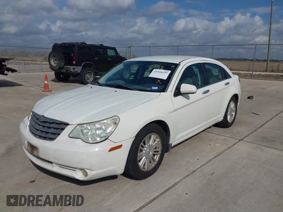 ✅ 2008 Chrysler Sebring • VIN: 1C3LC66J68N284521 • Lot: 41508199. Listed on IAAI with 217,216 mi. Free auction sales archive from the USA and detailed vehicle history report at DreamBid. Image 2.