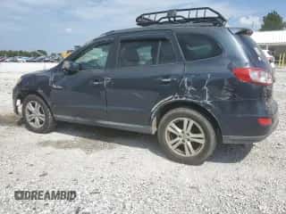 2011 Hyundai Santa Fe SE z VIN 5XYZHDAG4BG061528, wystawiony jako Copart lot #70642964 z przebiegiem 168 666 mil mil oraz Szkoda całkowita • Salvage title. Historia ofert i sprzedaży dostępna na DreamBid. Obrazek 2.