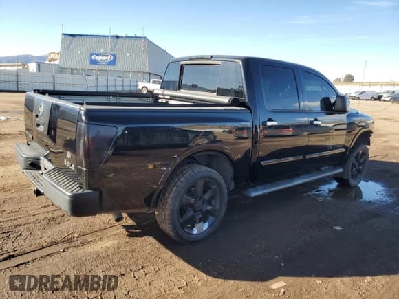 ✅ 2009 Nissan Titan XE • VIN: 1N6AA07CX9N313703 • Lot: 42649345. Listed on Copart with 142,430 mi. Free auction sales archive from the USA and detailed vehicle history report at DreamBid. Image 3.