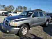 ✅ 2005 Dodge Dakota SLT • VIN: 1D7HE48N55S160968 • Лот: 76447804. Размещён на Copart с пробегом 149 357 миль миль. Получите бесплатный доступ к архиву аукционных продаж из США и посмотрите подробный отчёт об истории автомобиля на DreamBid. Изображение 1.