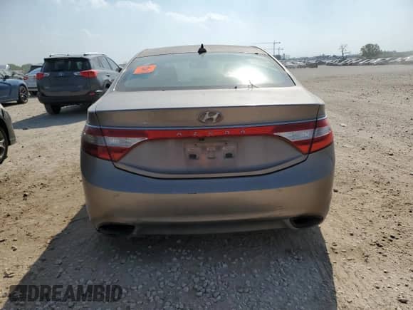 2013 Hyundai Azera z VIN KMHFG4JG4DA217863, wystawiony jako Copart lot #53840575 z przebiegiem Nie podano mil oraz Czysty tytuł • Clean title. Historia ofert i sprzedaży dostępna na DreamBid. Obrazek 6.