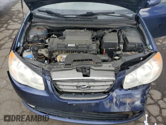 2009 Hyundai Elantra GLS z VIN KMHDU46D69U823833, wystawiony jako Copart lot #74582964 z przebiegiem 149 093 mil mil oraz Szkoda całkowita • Salvage title. Historia ofert i sprzedaży dostępna na DreamBid. Obrazek 11.