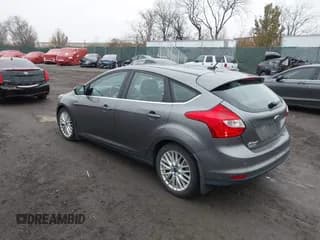 ✅ 2014 Ford Focus Titanium • VIN: 1FADP3N29EL422630 • Lot: 43743369. Wystawiony na IAAI z przebiegiem 96 753 mil. Bezpłatny archiwum sprzedaży aukcyjnych z USA i szczegółowy raport historii pojazdu na DreamBid. Zdjęcie 3.