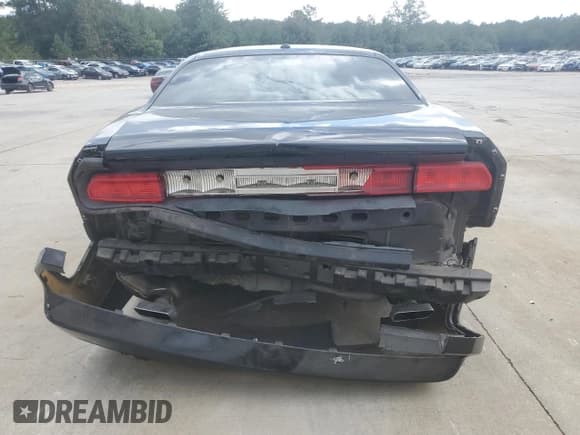 ✅ 2013 Dodge Challenger SXT • VIN: 2C3CDYAG7DH592935 • Lot: 84277125. Wystawiony na Copart z przebiegiem 204 885 mil. Bezpłatny archiwum sprzedaży aukcyjnych z USA i szczegółowy raport historii pojazdu na DreamBid. Zdjęcie 6.