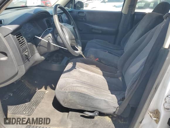 2003 Dodge Dakota SLT z VIN 1D7HL48X93S269096, wystawiony jako Copart lot #56119835 z przebiegiem 249 389 mil mil oraz Szkoda całkowita • Salvage title. Historia ofert i sprzedaży dostępna na DreamBid. Obrazek 7.