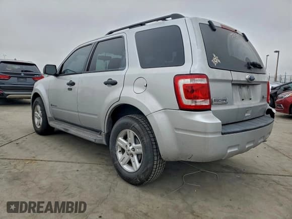 ✅ 2010 Ford Escape Hybrid • VIN: 1FMCU5K3XAKC65709 • Lot: 95794955. Wystawiony na Copart z przebiegiem 166 781 mil. Bezpłatny archiwum sprzedaży aukcyjnych z USA i szczegółowy raport historii pojazdu na DreamBid. Zdjęcie 2.