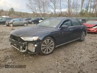 ✅ 2019 Audi A8 • VIN: WAU8EAF82KN024763 • Лот: 80981844. Опубликован ранее на Copart с пробегом 49 590 миль. Бесплатный доступ к архиву аукционных продаж из США и подробный отчёт об истории автомобиля на DreamBid. Изображение 1.