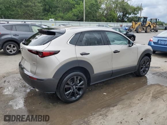 ✅ 2023 Mazda CX-30 Premium • VIN: 3MVDMBDY8PM561294 • Lot: 63564815. Listed on Copart with 7,110 mi. Free auction sales archive from the USA and detailed vehicle history report at DreamBid. Image 3.