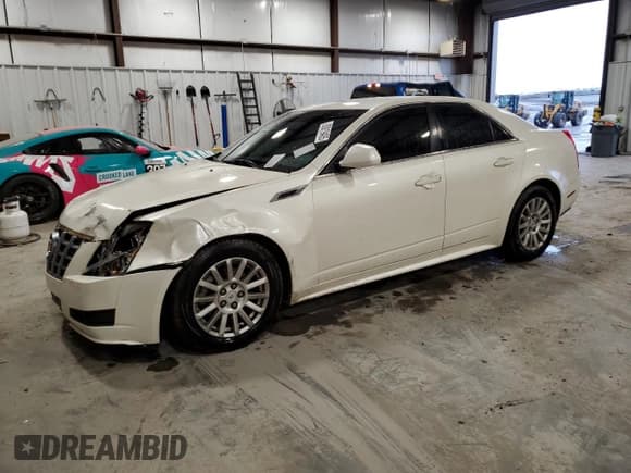 ✅ 2012 Cadillac CTS • VIN: 1G6DC5E55C0141633 • Лот: 93919405. Опубликован ранее на Copart с пробегом 83 471 миль. Бесплатный доступ к архиву аукционных продаж из США и подробный отчёт об истории автомобиля на DreamBid. Изображение 1.