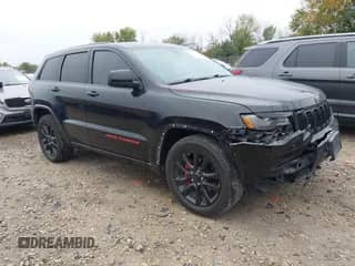 2018 Jeep Grand Cherokee Laredo E z VIN 1C4RJEAG8JC281557, wystawiony jako IAAI lot #43436885 z przebiegiem 75 063 mil mil oraz . Historia ofert i sprzedaży dostępna na DreamBid. Obrazek 1.