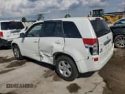 ✅ 2012 Suzuki Grand Vitara Premium • VIN: JS3TE0D64C4100145 • Lot: 62714985. Listed on Copart with 55,786 mi. Free auction sales archive from the USA and detailed vehicle history report at DreamBid. Image 2.