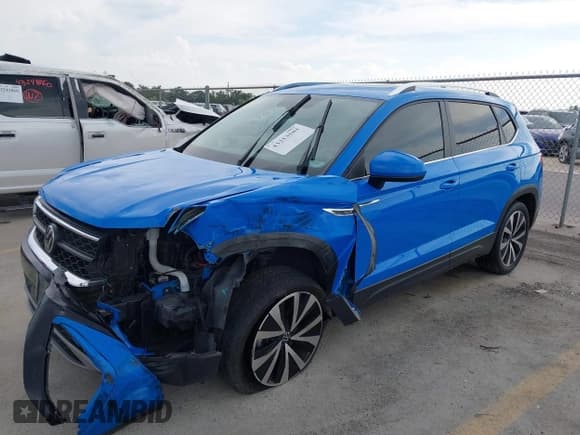 ✅ 2023 Volkswagen Taos SE • VIN: 3VVEX7B25PM314308 • Лот: 43253581. Опубликован ранее на IAAI с пробегом 31 730 миль. Бесплатный доступ к архиву аукционных продаж из США и подробный отчёт об истории автомобиля на DreamBid. Изображение 2.