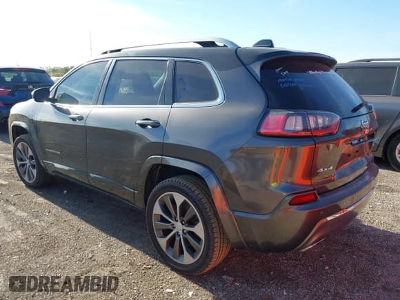 ✅ 2019 Jeep Cherokee Overland • VIN: 1C4PJMJN1KD123900 • Лот: 43350986. Опубликован ранее на IAAI с пробегом 105 541 миль. Бесплатный доступ к архиву аукционных продаж из США и подробный отчёт об истории автомобиля на DreamBid. Изображение 3.