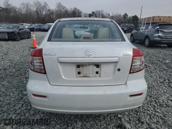 ✅ 2013 Suzuki SX4 LE • VIN: JS2YC5A37D6101979 • Лот: 42185855. Опубликован ранее на Copart с пробегом 118 855 миль. Бесплатный доступ к архиву аукционных продаж из США и подробный отчёт об истории автомобиля на DreamBid. Изображение 6.