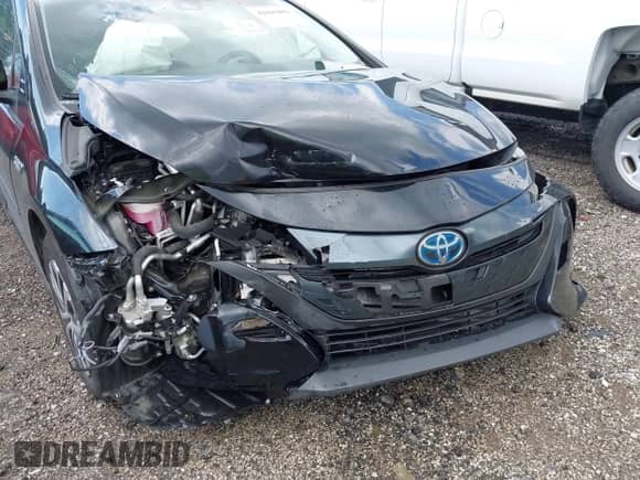 2022 Toyota Prius Limited z VIN JTDKAMFPXN3227770, wystawiony jako IAAI lot #42695882 z przebiegiem 42 373 mil mil oraz . Historia ofert i sprzedaży dostępna na DreamBid. Obrazek 6.