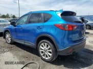 ✅ 2013 Mazda CX-5 Grand Touring • VIN: JM3KE2DE1D0152779 • Lot: 53749045. Listed on Copart with 100,419 mi. Free auction sales archive from the USA and detailed vehicle history report at DreamBid. Image 2.