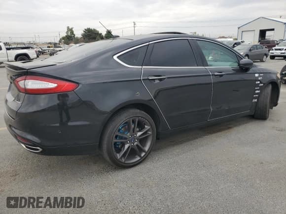 ✅ 2013 Ford Fusion Titanium • VIN: 3FA6P0D98DR231643 • Лот: 70396405. Опубликован ранее на Copart с пробегом 239 278 миль. Бесплатный доступ к архиву аукционных продаж из США и подробный отчёт об истории автомобиля на DreamBid. Изображение 3.