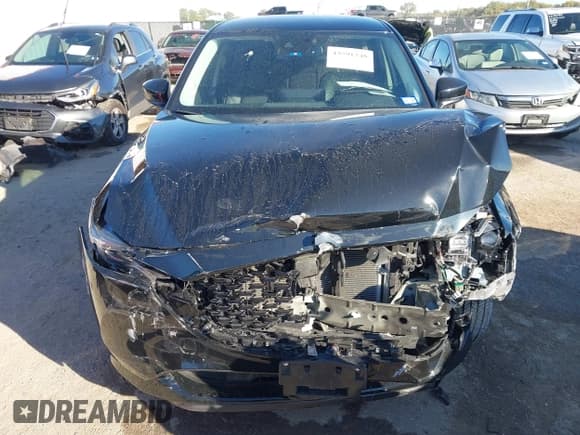 ✅ 2025 Mazda CX-5 S Carbon Edition • VIN: JM3KFBCM7S0690275 • Lot: 43591248. Listed on IAAI with 4,239 mi. Free auction sales archive from the USA and detailed vehicle history report at DreamBid. Image 12.