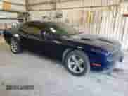 2016 Dodge Challenger SXT Plus с VIN 2C3CDZAG9GH131391, выставлен на аукционе Copart как лот 71879945 с пробегом 89 216 миль миль и Списание • Salvage title. История ставок и продаж доступна на DreamBid. Изображение 4.