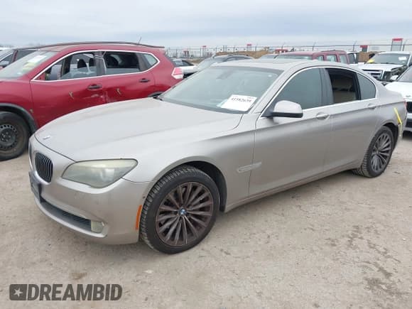 ✅ 2012 BMW 7 Series 740i • VIN: WBAKA4C51CC613670 • Lot: 41582639. Listed on IAAI with 149,753 mi. Free auction sales archive from the USA and detailed vehicle history report at DreamBid. Image 2.