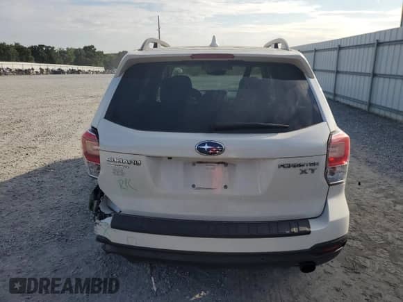 2018 Subaru Forester Touring z VIN JF2SJGWC9JH593863, wystawiony jako Copart lot #65283225 z przebiegiem 50 130 mil mil oraz Szkoda całkowita • Salvage title. Historia ofert i sprzedaży dostępna na DreamBid. Obrazek 6.