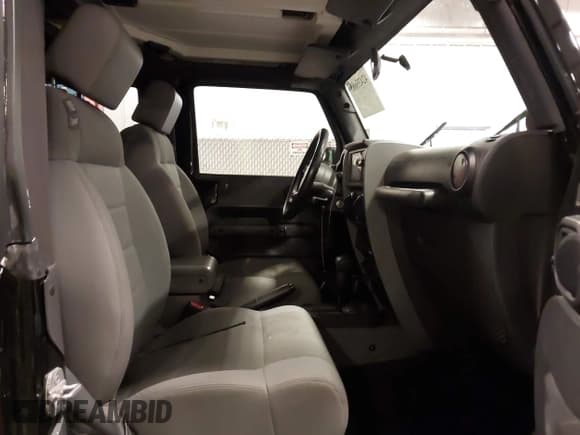 ✅ 2007 Jeep Wrangler Sahara • VIN: 1J8FA54167L197023 • Лот: 42435685. Опубликован ранее на IAAI с пробегом 115 282 миль. Бесплатный доступ к архиву аукционных продаж из США и подробный отчёт об истории автомобиля на DreamBid. Изображение 5.