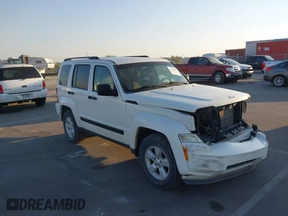 ✅ 2010 Jeep Liberty Sport • VIN: 1J4PN2GK8AW114162 • Lot: 43364849. Listed on IAAI with 122,883 mi. Free auction sales archive from the USA and detailed vehicle history report at DreamBid. Image 1.