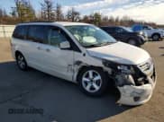 ✅ 2011 Volkswagen Routan SE • VIN: 2V4RW3DG7BR740318 • Lot: 93069845. Listed on Copart with 262,581 mi. Free auction sales archive from the USA and detailed vehicle history report at DreamBid. Image 4.