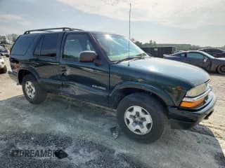 ✅ 2002 Chevrolet Blazer LS • VIN: 1GNDT13W42K208122 • Lot: 69121565. Wystawiony na Copart z przebiegiem 111 706 mil. Bezpłatny archiwum sprzedaży aukcyjnych z USA i szczegółowy raport historii pojazdu na DreamBid. Zdjęcie 4.