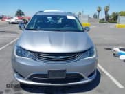 ✅ 2018 Chrysler Pacifica Hybrid Limited • VIN: 2C4RC1N7XJR229934 • Лот: 42777086. Опубликован ранее на IAAI с пробегом 86 163 миль. Бесплатный доступ к архиву аукционных продаж из США и подробный отчёт об истории автомобиля на DreamBid. Изображение 13.