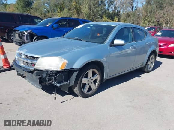 ✅ 2013 Dodge Avenger SXT • VIN: 1C3CDZCB7DN680575 • Lot: 43463578. Listed on IAAI with 190,494 mi. Free auction sales archive from the USA and detailed vehicle history report at DreamBid. Image 2.