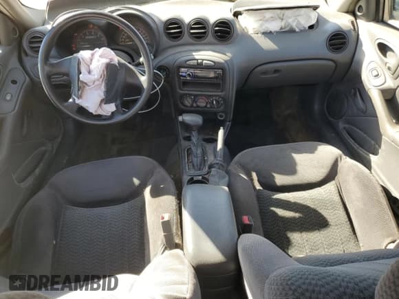 ✅ 2002 Pontiac Grand Am SE • VIN: 1G2NE52FX2C131125 • Лот: 73484594. Опубликован ранее на Copart с пробегом 204 648 миль. Бесплатный доступ к архиву аукционных продаж из США и подробный отчёт об истории автомобиля на DreamBid. Изображение 8.