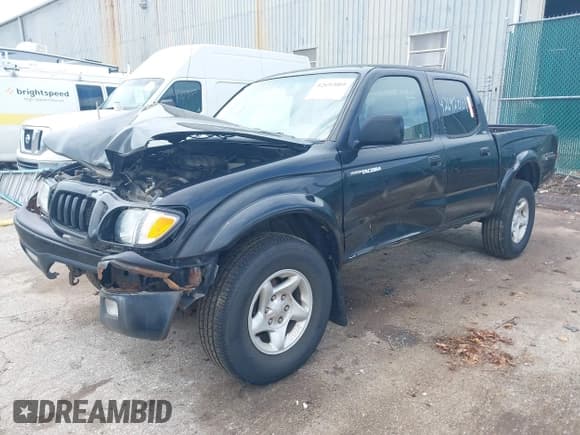 ✅ 2003 Toyota Tacoma • VIN: 5TEHN72N63Z301821 • Lot: 42692001. Listed on IAAI with 176,986 mi. Free auction sales archive from the USA and detailed vehicle history report at DreamBid. Image 2.