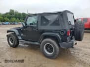 ✅ 2015 Jeep Wrangler Sahara • VIN: 1C4AJWBGXFL649245 • Лот: 69688515. Опубликован ранее на Copart с пробегом 158 652 миль. Бесплатный доступ к архиву аукционных продаж из США и подробный отчёт об истории автомобиля на DreamBid. Изображение 2.