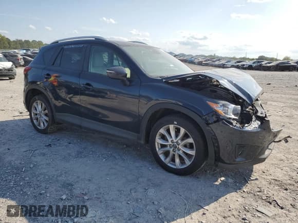 ✅ 2015 Mazda CX-5 Grand Touring • VIN: JM3KE4DY5F0491909 • Лот: 72039105. Опубликован ранее на Copart с пробегом 122 148 миль. Бесплатный доступ к архиву аукционных продаж из США и подробный отчёт об истории автомобиля на DreamBid. Изображение 4.