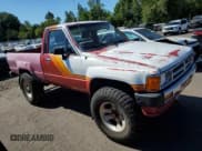 ✅ 1987 Toyota Pickup • VIN: JT4RN63B0H0105187 • Lot: 66365665. Wystawiony na Copart z przebiegiem 228 517 mil. Bezpłatny archiwum sprzedaży aukcyjnych z USA i szczegółowy raport historii pojazdu na DreamBid. Zdjęcie 4.