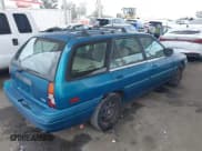 ✅ 1994 Ford Escort • VIN: 3FARP15J4RR144017 • Lot: 42398050. Listed on IAAI with 81,539 mi. Free auction sales archive from the USA and detailed vehicle history report at DreamBid. Image 4.