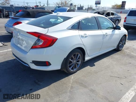 ✅ 2021 Honda Civic EX-L • VIN: 19XFC1F73ME202145 • Лот: 42347586. Опубликован ранее на IAAI с пробегом 27 546 миль. Бесплатный доступ к архиву аукционных продаж из США и подробный отчёт об истории автомобиля на DreamBid. Изображение 4.