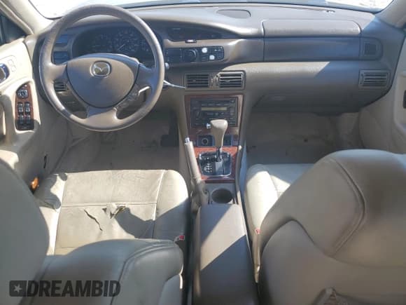 ✅ 1999 Mazda Millenia • VIN: JM1TA2217X1502746 • Lot: 72165894. Listed on Copart with 196,957 mi. Free auction sales archive from the USA and detailed vehicle history report at DreamBid. Image 8.