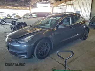 ✅ 2018 Tesla Model 3 Long Range Battery • VIN: 5YJ3E1EA9JF157700 • Лот: 94802325. Опубликован ранее на Copart с пробегом 56 369 миль. Бесплатный доступ к архиву аукционных продаж из США и подробный отчёт об истории автомобиля на DreamBid. Изображение 1.