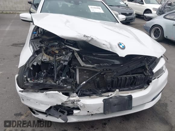 ✅ 2018 BMW 5 Series 540i • VIN: WBAJE5C53JWA98577 • Lot: 42206800. Listed on IAAI with 65,003 mi. Free auction sales archive from the USA and detailed vehicle history report at DreamBid. Image 6.