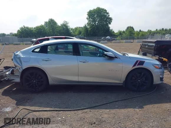 2020 Chevrolet Malibu Premier with VIN 1G1ZE5SX1LF144599, listed as a IAAI auction lot 42603515 with 69,715 mi miles and . Bid and sale history available at DreamBid. Image 14.