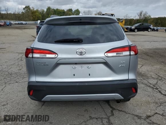 ✅ 2023 Toyota Corolla Cross LE • VIN: 7MUBAABG1PV067158 • Lot: 82475075. Listed on Copart with 34,950 mi. Free auction sales archive from the USA and detailed vehicle history report at DreamBid. Image 6.