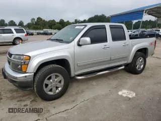 ✅ 2011 Chevrolet Colorado 2LT • VIN: 1GCHSDFE0B8132817 • Лот: 71313424. Опубликован ранее на Copart с пробегом 264 795 миль. Бесплатный доступ к архиву аукционных продаж из США и подробный отчёт об истории автомобиля на DreamBid. Изображение 1.