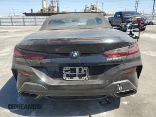 ✅ 2019 BMW 8 Series M850i xDrive • VIN: WBAFY4C5XKBX29838 • Лот: 61364633. Опубликован ранее на Copart с пробегом 21 975 миль. Бесплатный доступ к архиву аукционных продаж из США и подробный отчёт об истории автомобиля на DreamBid. Изображение 6.